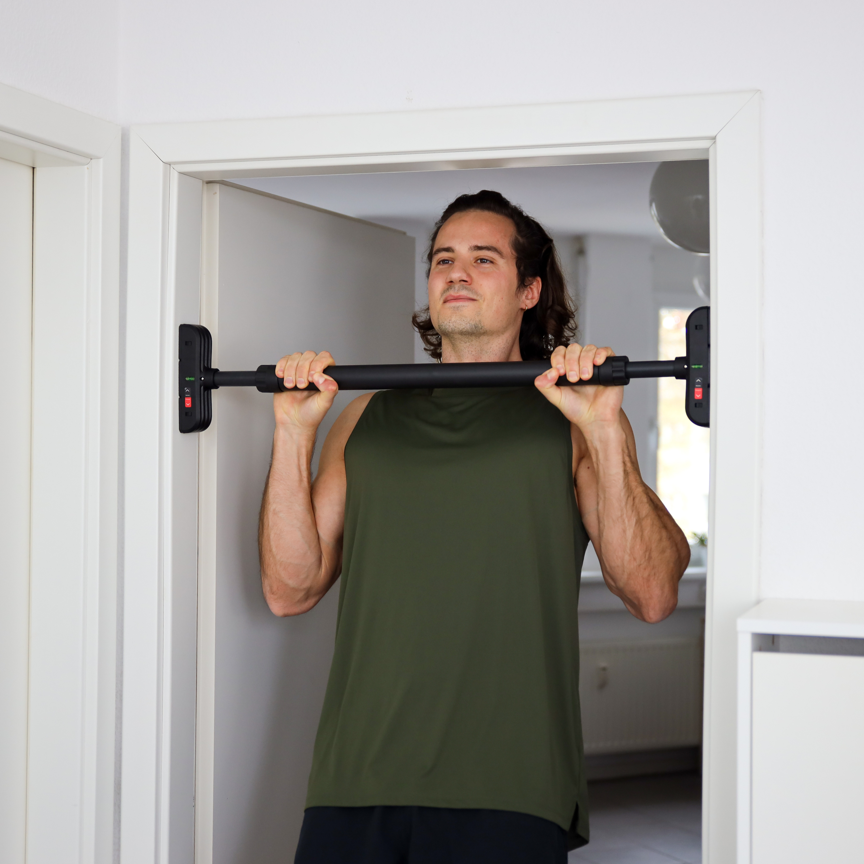 Teleskopische Klimmzugstange Türrahmen - zum Einklemmen