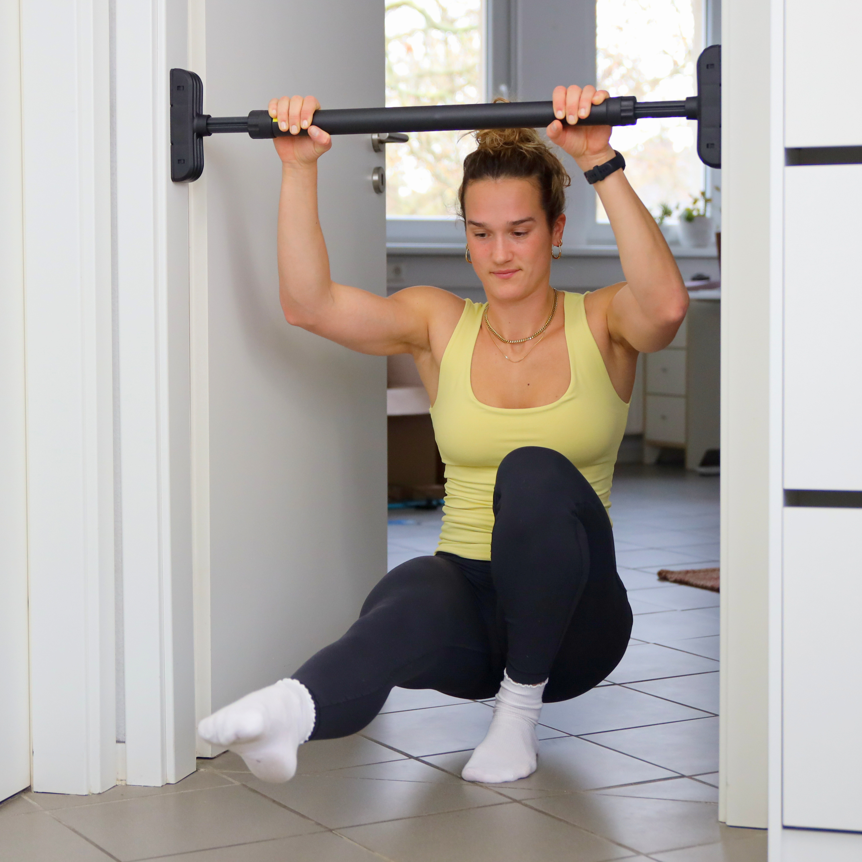 Teleskopische Klimmzugstange Türrahmen - zum Einklemmen